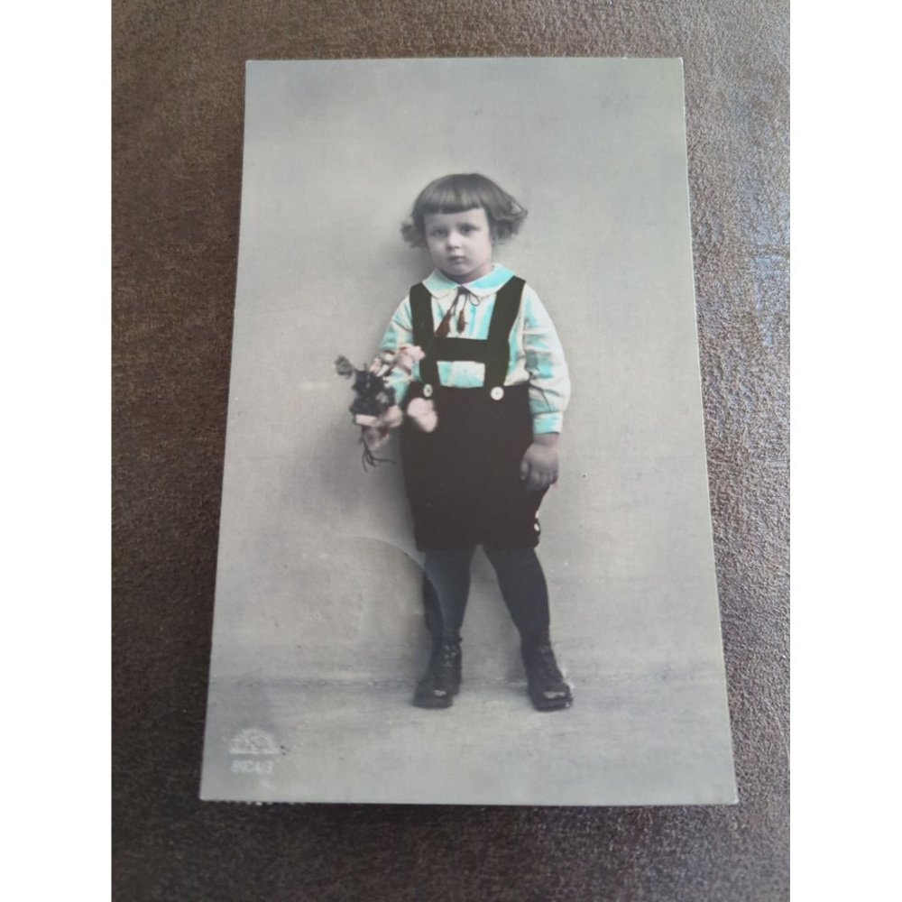 RPPC Cute Dutch Girl with Flowers Colorized Small Art 1924 Torn Stamp 98 Years